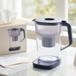 "Waterdrop ED01B Electric Water Filter Pitcher in an elegant flat-lay, showcasing its features for an online shopping review."